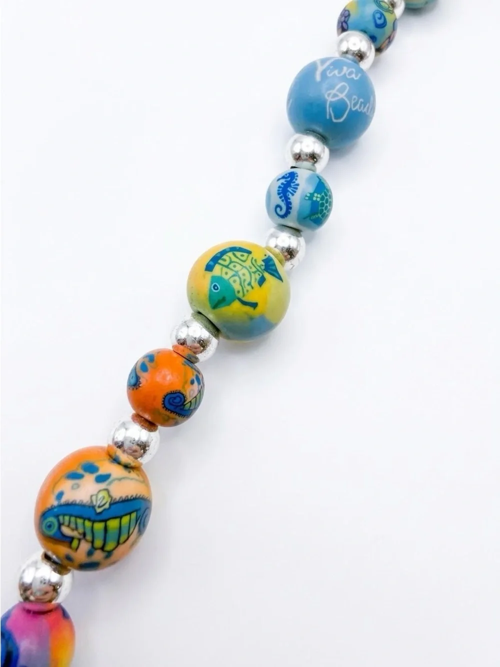 Viva clay bead phone case charm. With ocean wildlife.
